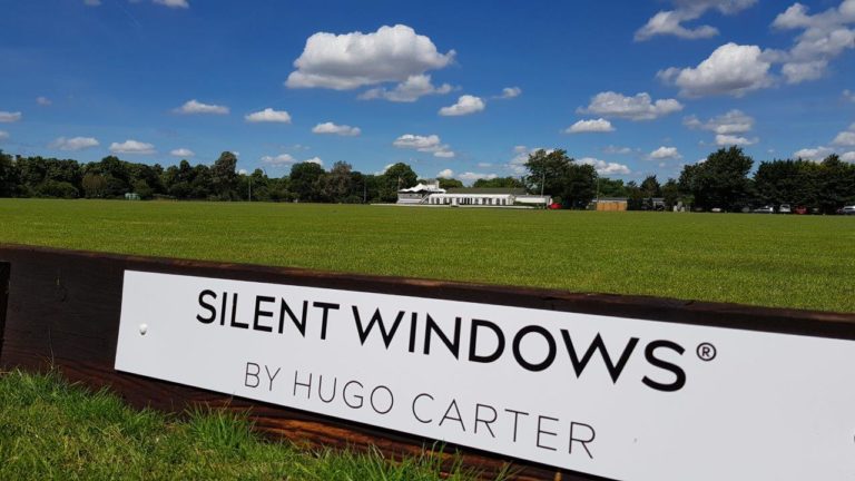 silent windows by Hugo Carters sign at a polo club